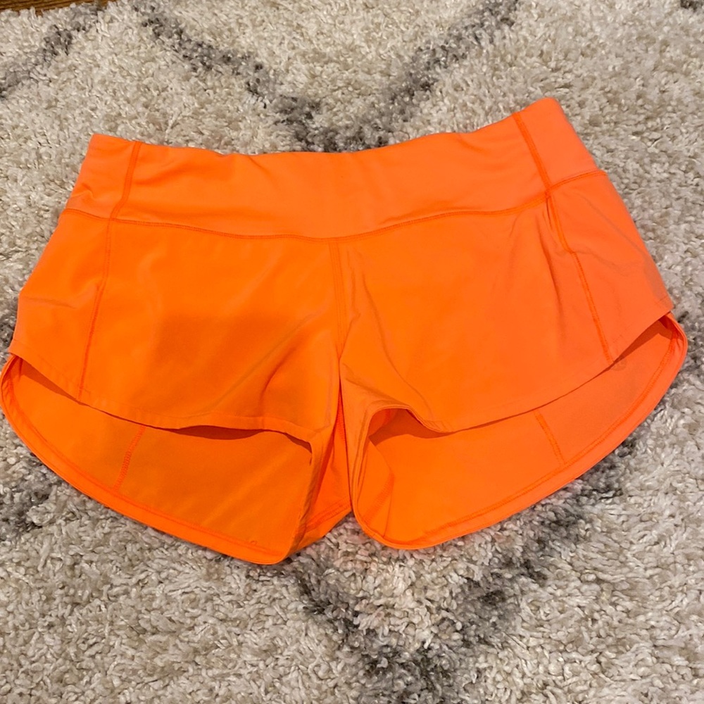 Bright orange lululemon 2.5” speed up shorts